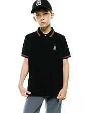 Kids Jaydon Pique Polo, black classic fit pique polo with red and white striped collar and cuffs, featuring a small embroidered Psycho Bunny skull logo on the left chest.