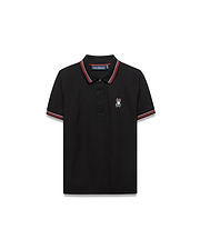 Kids Jaydon Pique Polo, black classic fit pique polo with red and white striped collar and cuffs, featuring a small embroidered Psycho Bunny skull logo on the left chest.