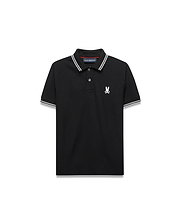 Kids Stan Pique Polo. Black classic fit pique polo with white double-striped collar and cuffs, red neck tape, and small white embroidered Psycho Bunny skull logo on left chest.