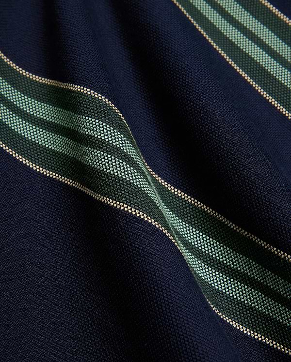 Kids Drew Striped L/S Pique Polo in navy, featuring a textured pique knit fabric with bold horizontal stripes in dark green, mint green, and thin beige accents. (6)