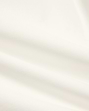 Kids' Klaus Pique Polo, a premium off-white polo featuring the distinctive textured pique fabric with elegant folds, reflecting Psycho Bunny's refined streetwear. (6)