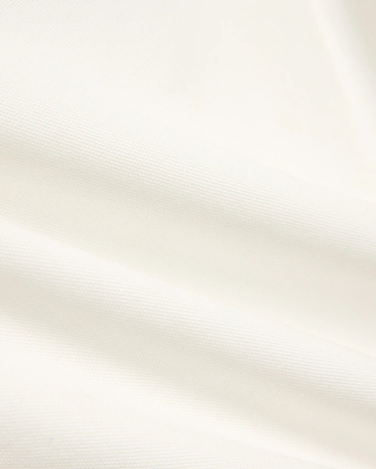 Kids' Klaus Pique Polo, a premium off-white polo featuring the distinctive textured pique fabric with elegant folds, reflecting Psycho Bunny's refined streetwear. (6)
