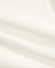 Kids' Klaus Pique Polo, a premium off-white polo featuring the distinctive textured pique fabric with elegant folds, reflecting Psycho Bunny's refined streetwear. (6)