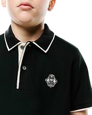 Kids Robin Pique Polo, a dark green classic fit pique knit polo shirt with white tipped collar, placket, and cuffs, featuring an embroidered Psycho Bunny skull logo on the left chest.