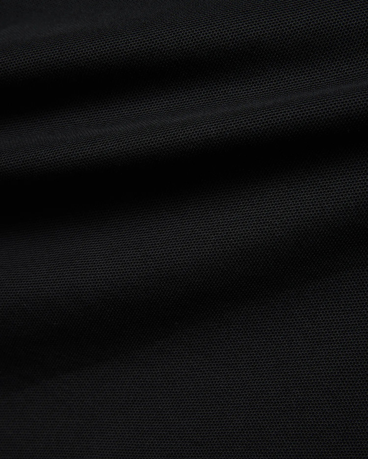 Black Kids Robin Pique Polo, a classic fit crafted from premium textured pique fabric, featuring the iconic embroidered Psycho Bunny skull logo on the left chest.