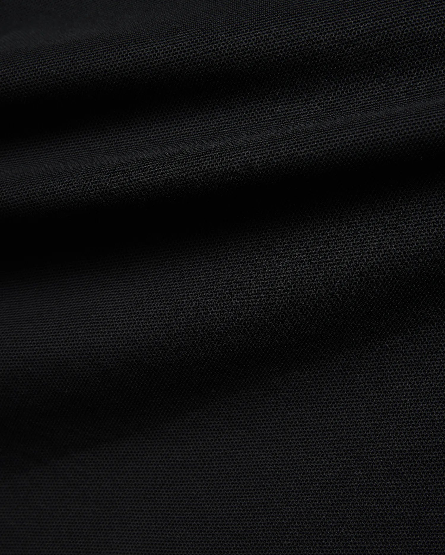 Black Kids Robin Pique Polo, a classic fit crafted from premium textured pique fabric, featuring the iconic embroidered Psycho Bunny skull logo on the left chest.