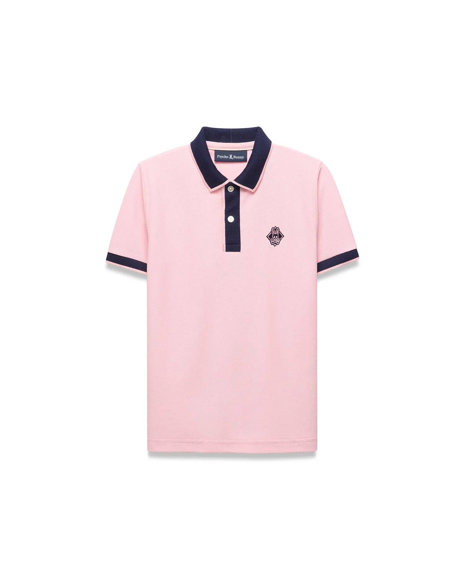 Kids Robin Pique Polo in pink pique knit, featuring a classic fit, navy blue ribbed collar, two-button placket, and sleeve cuffs, with an embroidered navy Psycho Bunny skull logo on the left chest.