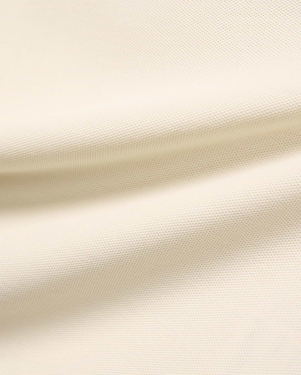 Kids Robin Pique Polo, a premium light cream polo shirt crafted from soft, breathable pique fabric, showcasing its refined, textured weave for comfort and style, perfect for everyday wear.