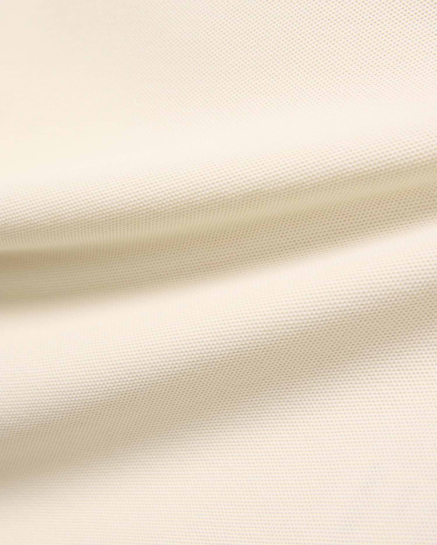 Kids Robin Pique Polo, a premium light cream polo shirt crafted from soft, breathable pique fabric, showcasing its refined, textured weave for comfort and style, perfect for everyday wear.