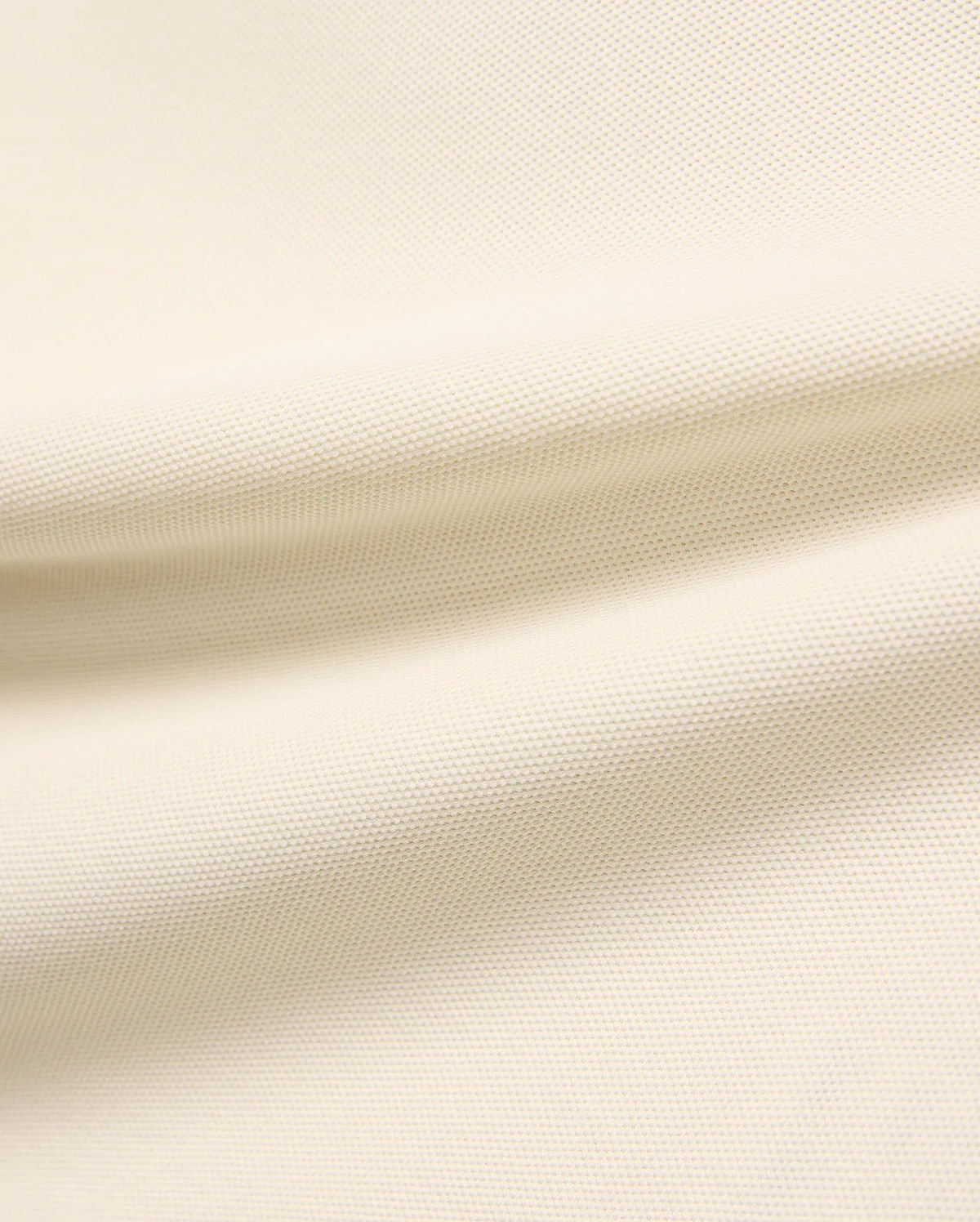 Kids Robin Pique Polo, a premium light cream polo shirt crafted from soft, breathable pique fabric, showcasing its refined, textured weave for comfort and style, perfect for everyday wear.