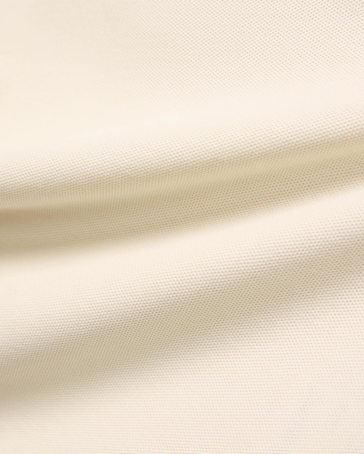 Kids Robin Pique Polo, a premium light cream polo shirt crafted from soft, breathable pique fabric, showcasing its refined, textured weave for comfort and style, perfect for everyday wear.