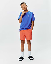 Kids Sunny Chest Graphic Tee, royal blue jersey with small white embroidered Psycho Bunny skull logo on left chest. Coral woven shorts with embroidered bunny logo on left leg, classic fit.