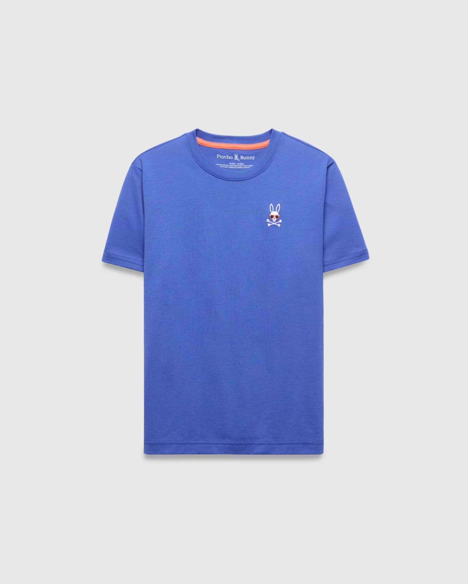 Kids Sunny Chest Graphic Tee, a vibrant blue classic fit jersey t-shirt featuring a small embroidered Psycho Bunny skull logo with sunglasses on the left chest and orange inner collar trim.