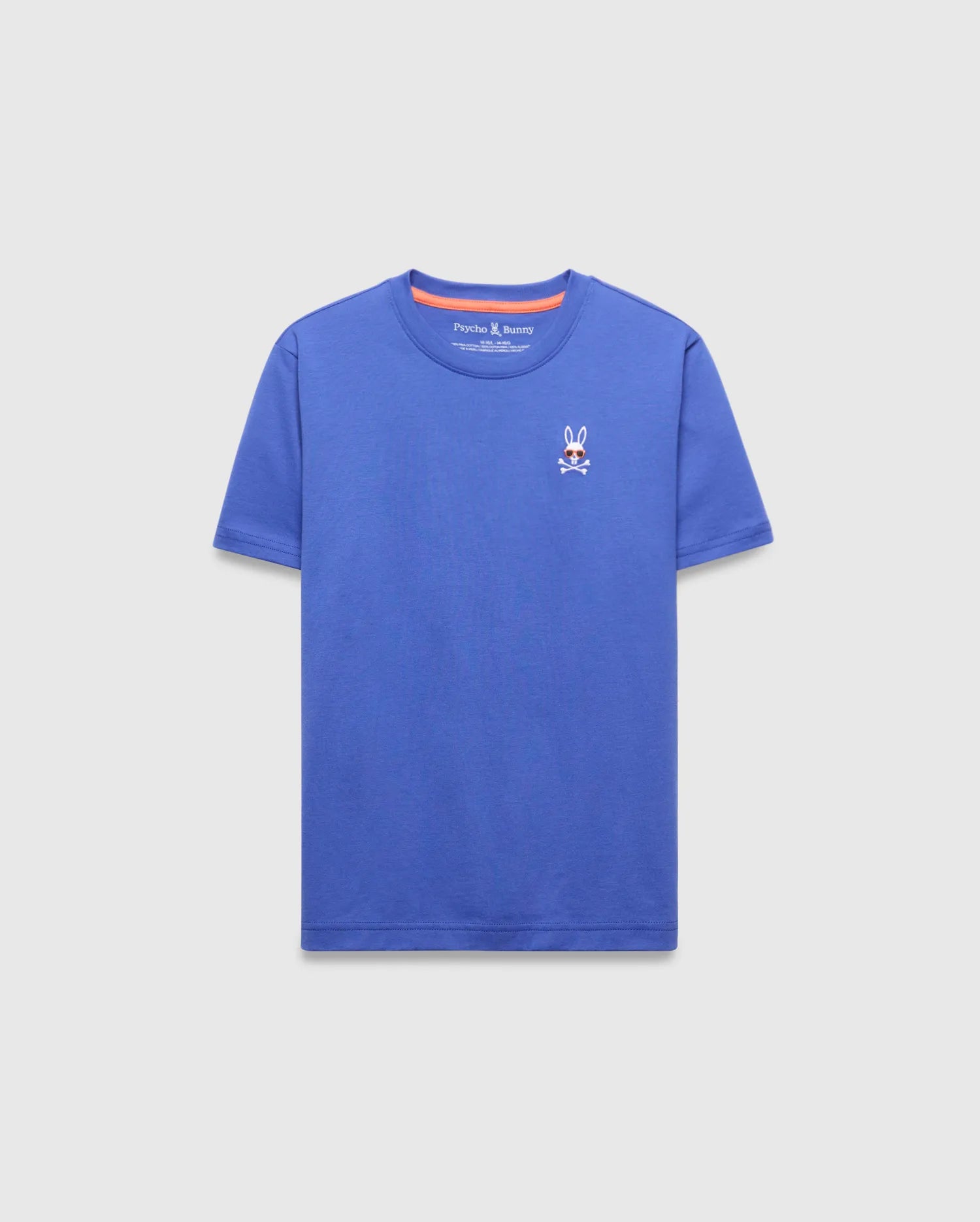 Kids Sunny Chest Graphic Tee, a vibrant blue classic fit jersey t-shirt featuring a small embroidered Psycho Bunny skull logo with sunglasses on the left chest and orange inner collar trim.