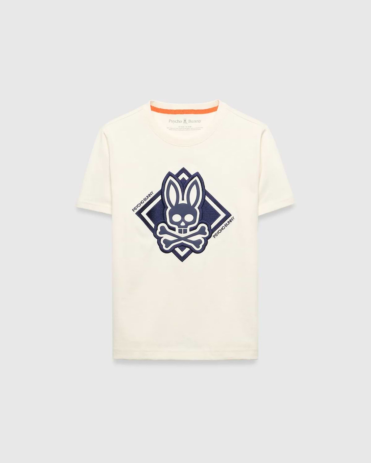 Kids Tobias Graphic Tee, a classic fit cream jersey t-shirt with a large, textured navy blue Psycho Bunny skull and crossbones logo graphic inside a diamond on the chest, featuring orange neckline trim.