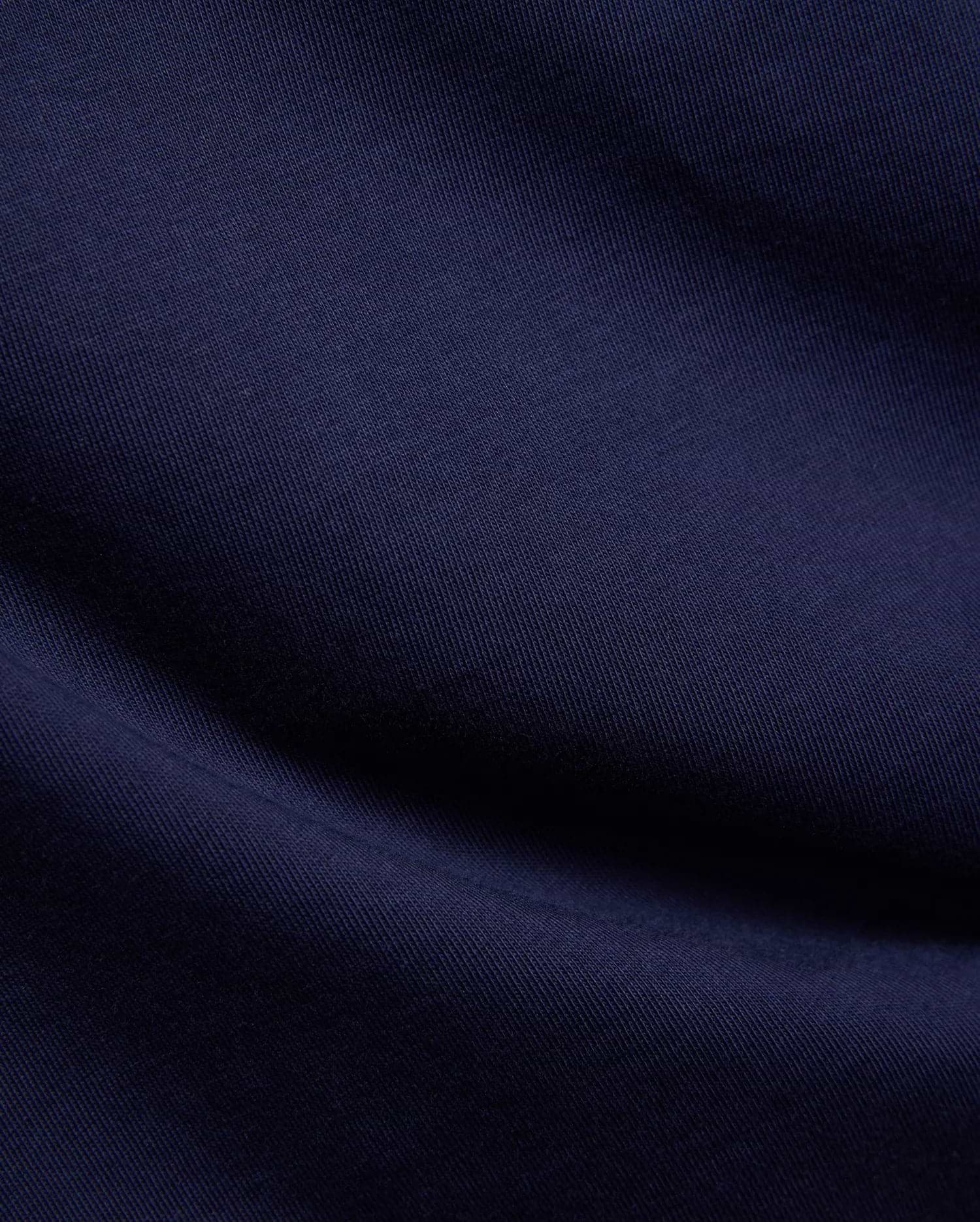Kids Frank Back Graphic Tee in rich navy blue, crafted from soft, finely woven jersey fabric, featuring the iconic Psycho Bunny skull logo and a bold back graphic.