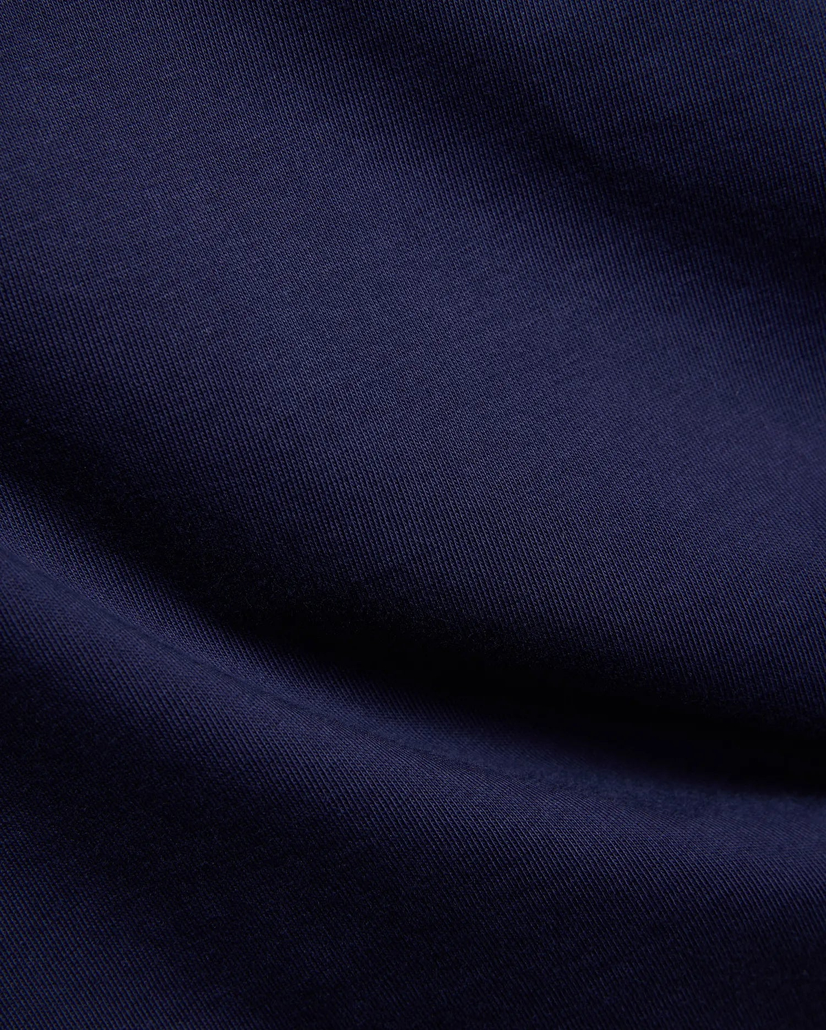 Kids Frank Back Graphic Tee in rich navy blue, crafted from soft, finely woven jersey fabric, featuring the iconic Psycho Bunny skull logo and a bold back graphic.