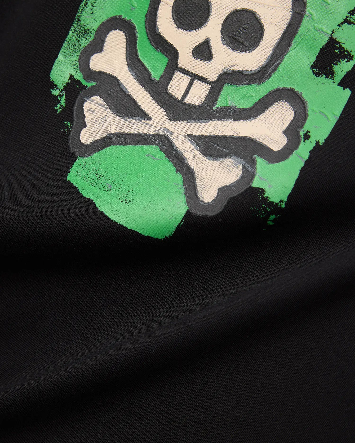 Black Kids Marcus Bunny Graphic Tee, classic fit jersey knit, featuring a large, textured beige and black bunny skull and crossbones graphic on a vibrant distressed green background.