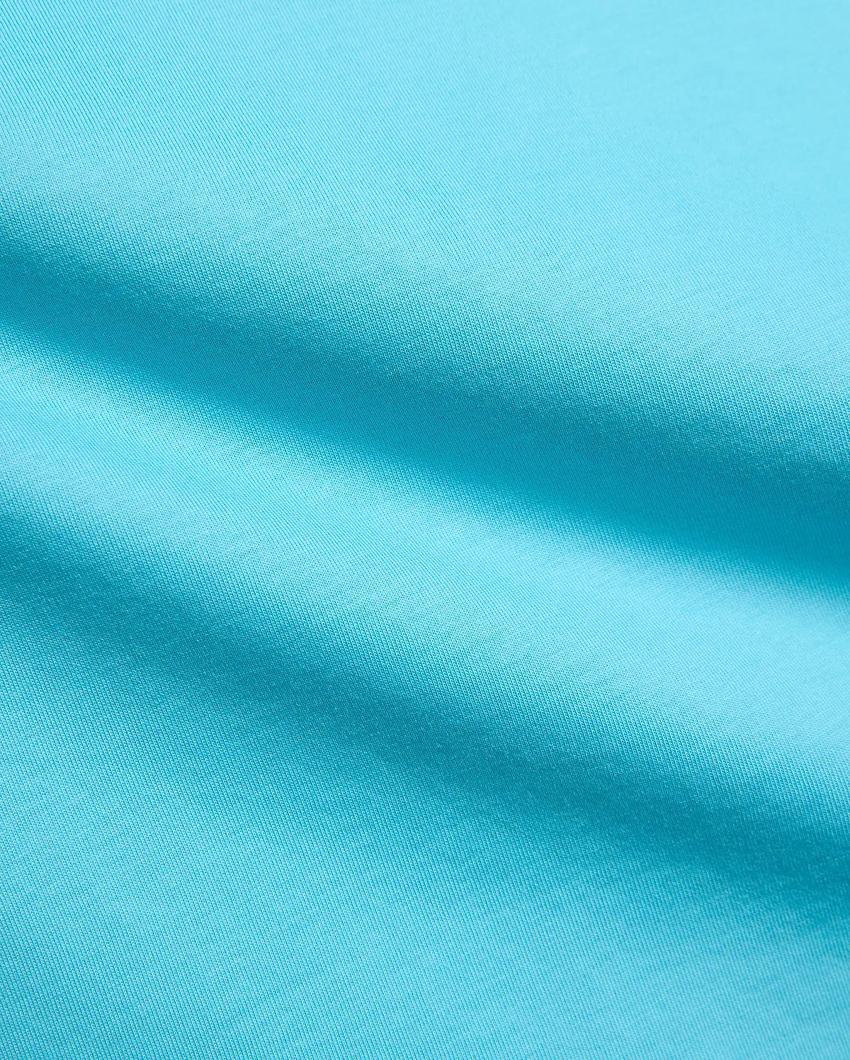 Kids Isaac Relaxed Fit Tee in vibrant aqua blue, crafted from soft jersey knit fabric, featuring the iconic small embroidered Psycho Bunny skull logo on the chest.