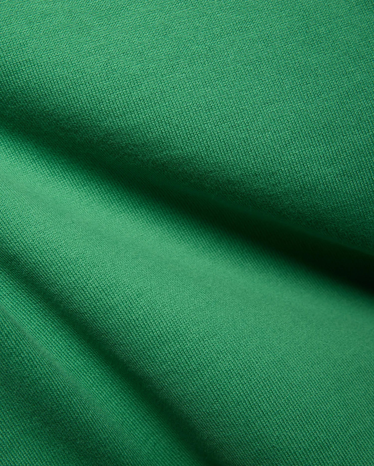 Psycho Bunny Kids Duncan Relaxed Fit Tee, vibrant emerald green jersey knit fabric with a soft, textured feel and subtle diagonal ribbing, showcasing premium quality for refined streetwear.