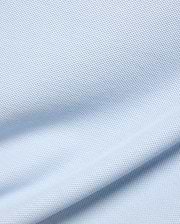 Kids Taylor Pique Tee in a soft, pale blue, featuring a finely textured, breathable pique knit fabric with gentle, flowing drapes and subtle shadows highlighting its classic weave. (5)