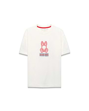 Kids Alex Relaxed Back Graphic Tee, an ecru jersey t-shirt with a relaxed fit, features a large central red and blue Psycho Bunny skull logo and repeated text graphic on the front, accented by a red inner collar.