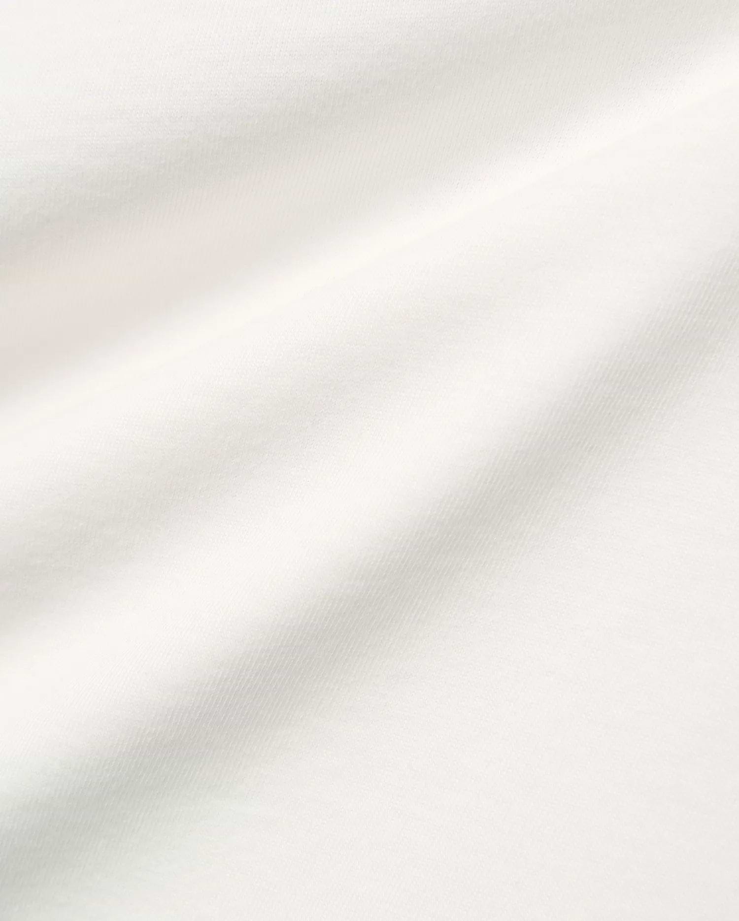 White Kids Alex Relaxed Back Graphic Tee, a soft jersey knit with subtle texture, featuring the iconic Psycho Bunny skull logo on the chest and a bold back graphic.