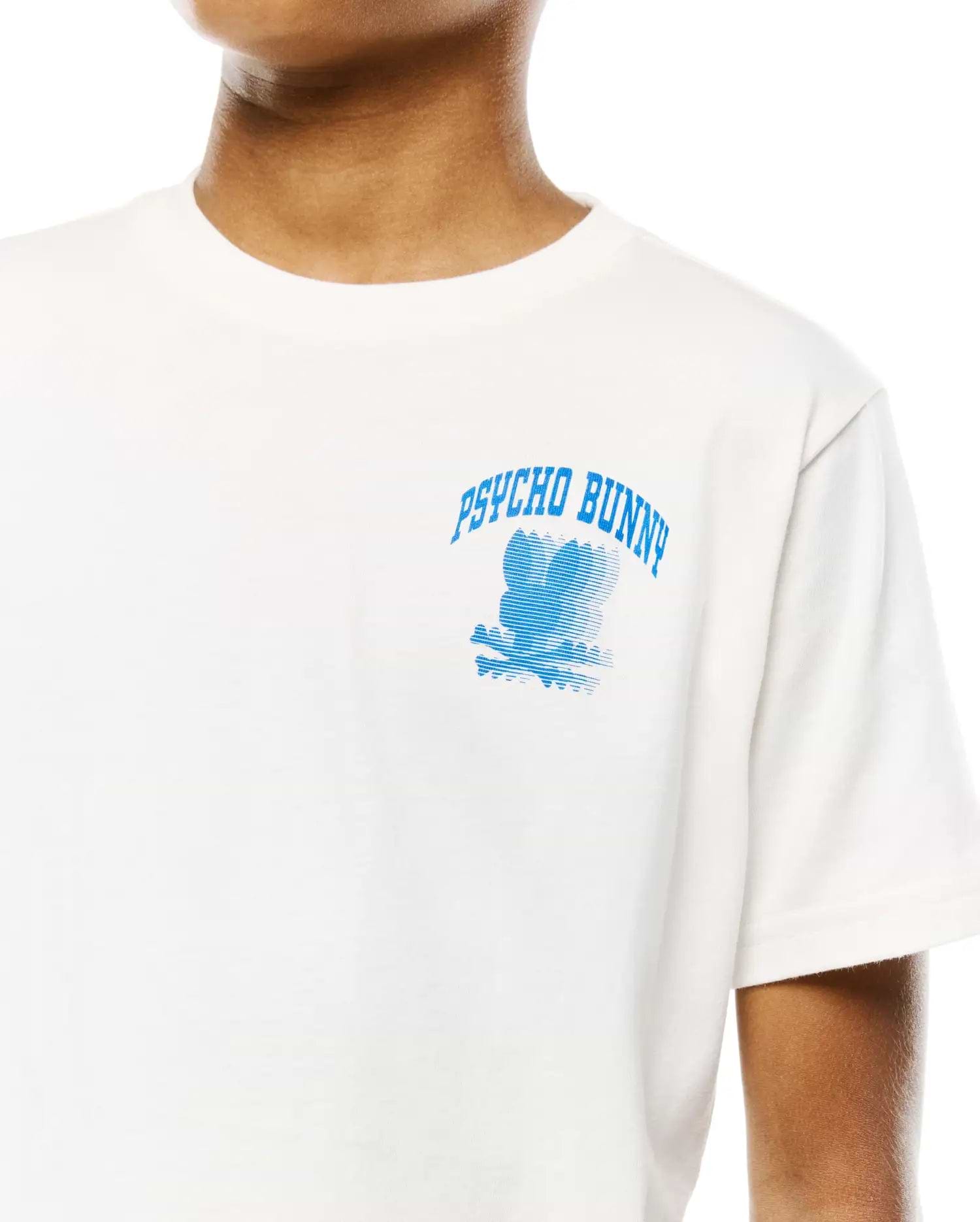 Kids Nathaniel Back Graphic Tee, cream classic fit jersey t-shirt featuring a blue arched PSYCHO BUNNY text and stylized bunny skull graphic on the chest.