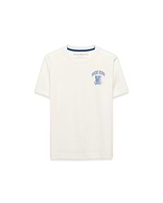 Cream Kids Nathaniel Back Graphic Tee, classic fit jersey with a blue Psycho Bunny text and bunny skull graphic on the left chest, featuring blue neck tape.
