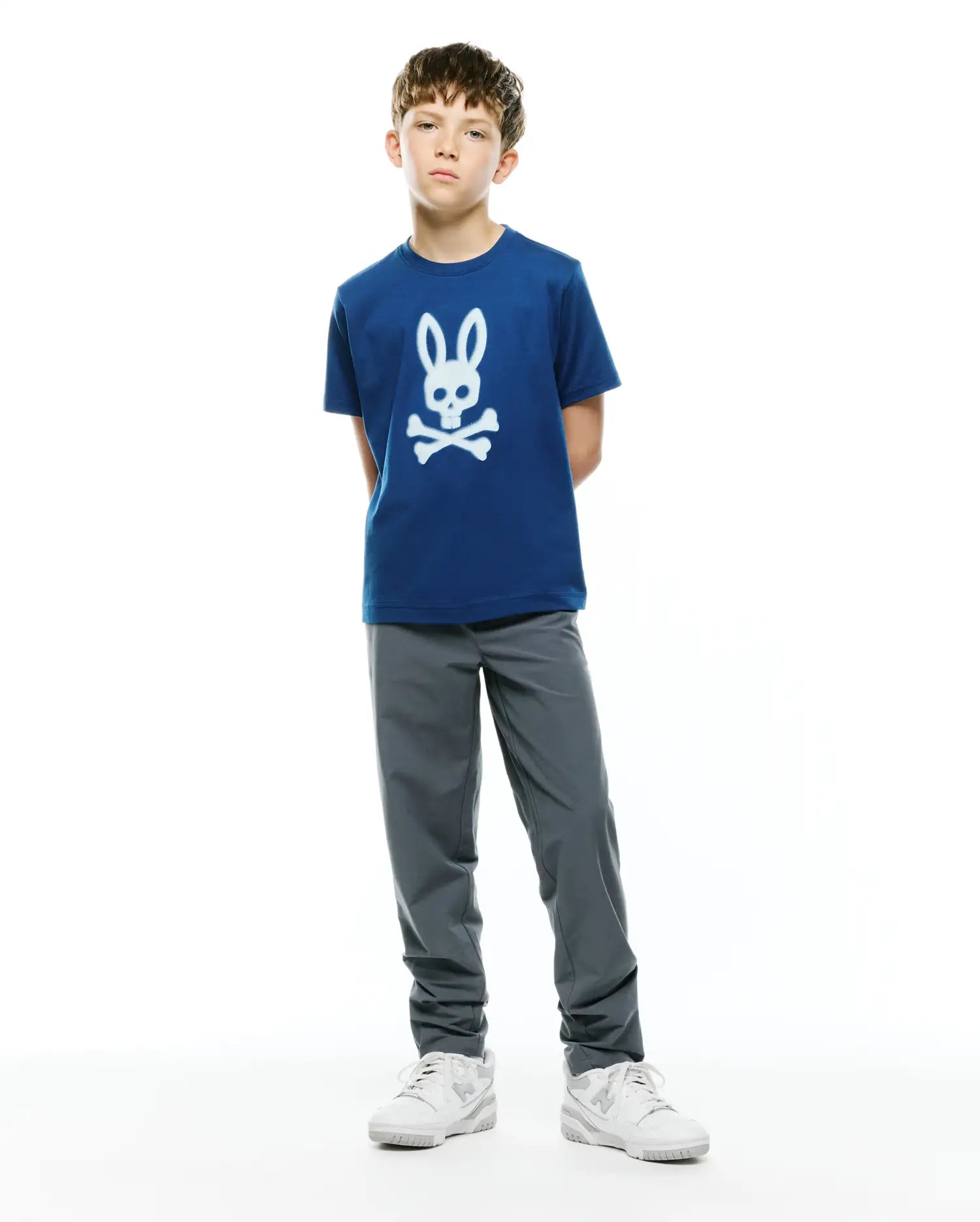Kids Emmanuel Graphic Tee in royal blue, featuring a large white Psycho Bunny skull logo graphic on the center chest, crafted from soft jersey knit in a classic fit.