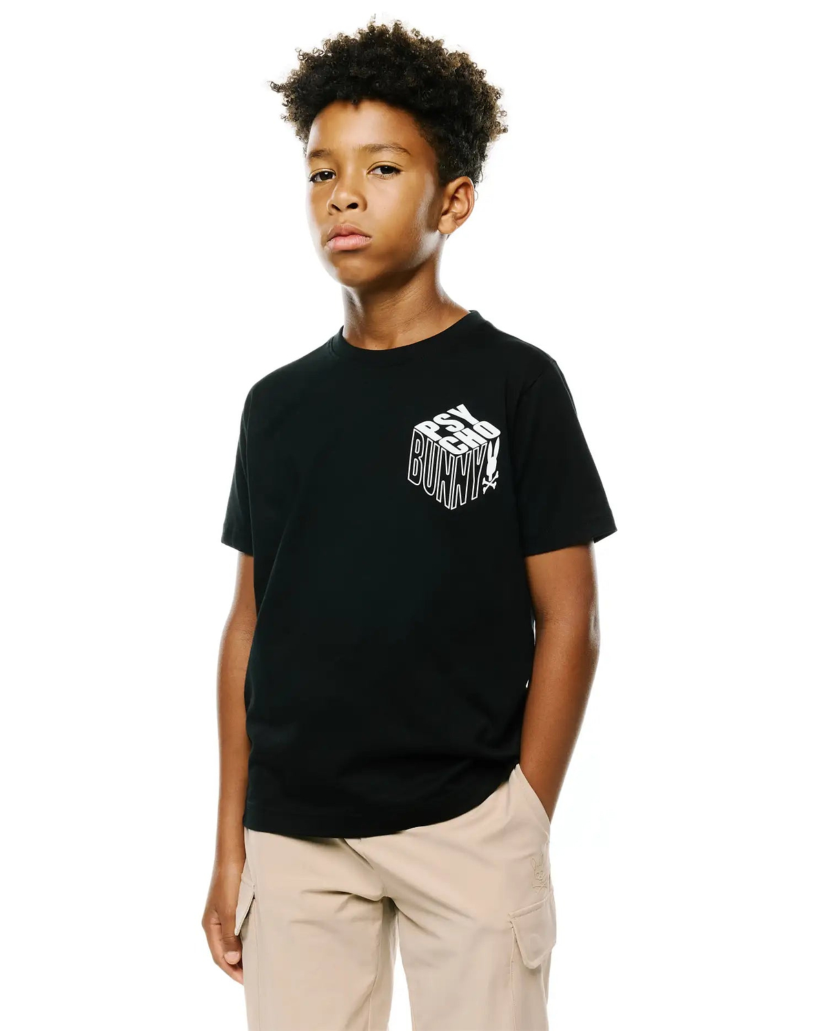 Kids Conan Back Graphic Tee, a black classic fit jersey t-shirt featuring a bold white 3D-effect Psycho Bunny text graphic and small bunny skull logo on the left chest.