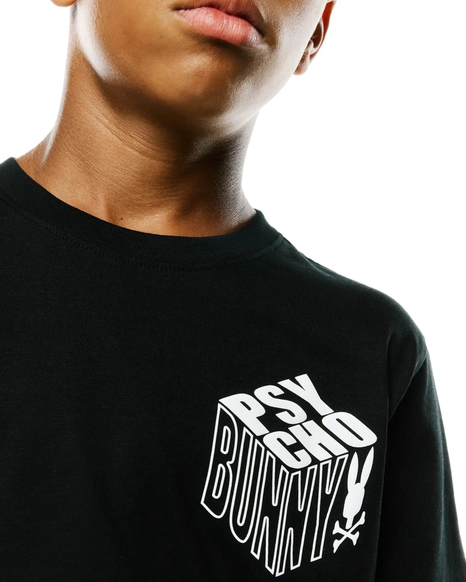 Kids Conan Back Graphic Tee in black jersey knit, featuring a large white 3D Psycho Bunny text logo with the iconic bunny skull on the chest, classic fit.