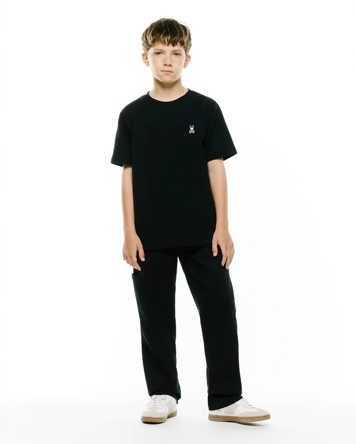 Kids Maxton Waffle Tee in black, a classic fit t-shirt with a subtle waffle texture, featuring a small white embroidered Psycho Bunny skull logo on the left chest.