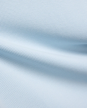 Kids Maxton Waffle Tee fabric in a soft sky blue, showcasing its distinctive raised waffle knit texture with subtle folds, ideal for comfortable, refined streetwear.