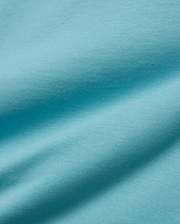Kids' Alfie Back Graphic Tee in vibrant aqua blue, soft jersey knit fabric with subtle texture and flowing drapes, featuring a back graphic for a stylish, comfortable look. (5)