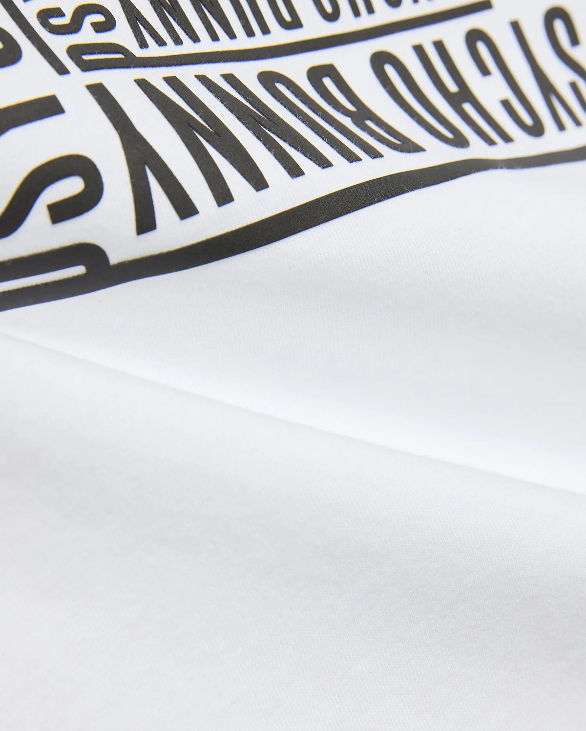 Kids' Raj Pima Graphic Tee in soft white Pima jersey knit, featuring a prominent, bold black PSYCHO BUNNY text graphic print, embodying premium streetwear style. (6)