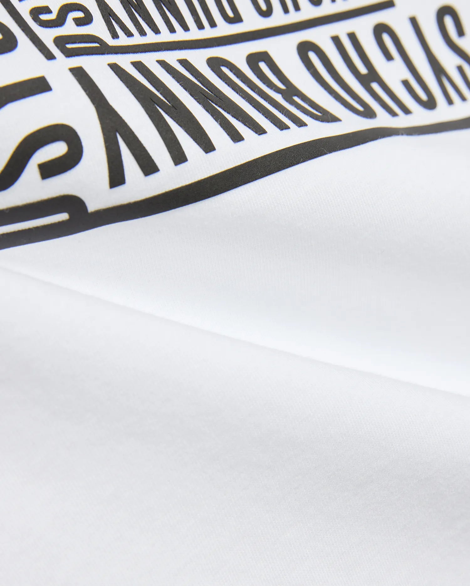 Kids' Raj Pima Graphic Tee in soft white Pima jersey knit, featuring a prominent, bold black PSYCHO BUNNY text graphic print, embodying premium streetwear style. (6)