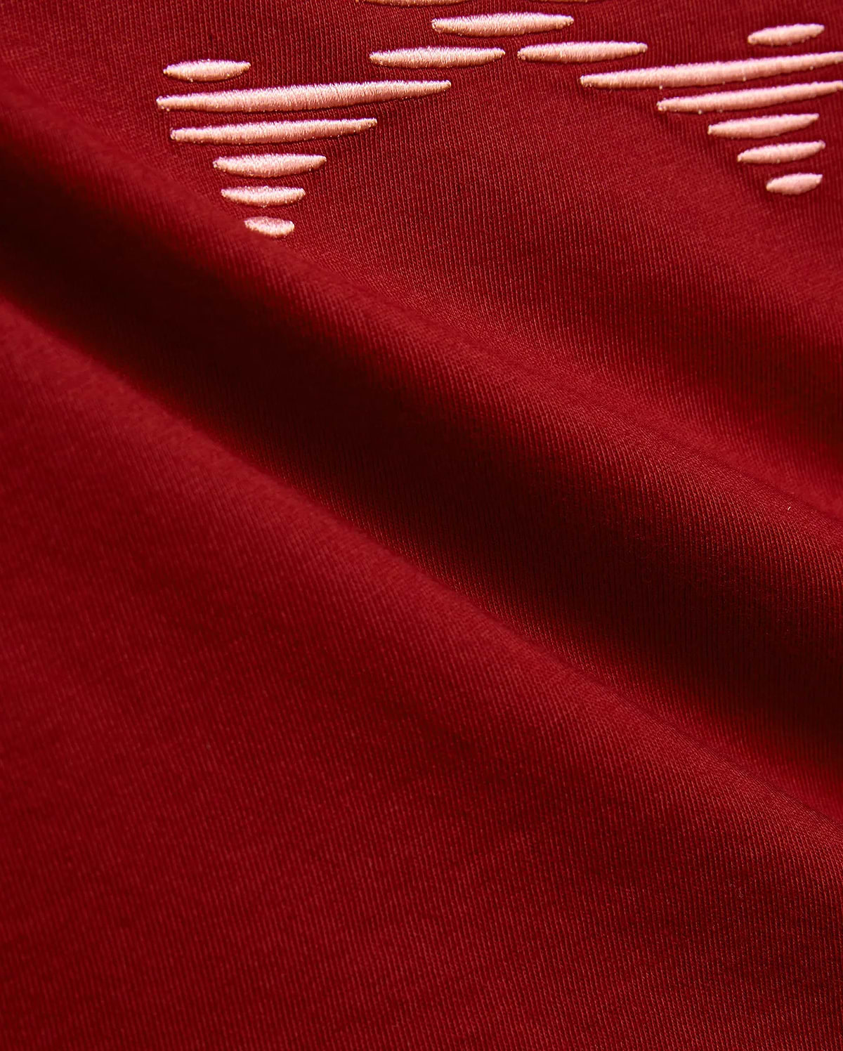 Kids' Slade Pima Graphic Tee in rich burgundy Pima cotton jersey, featuring a partial embroidered light pink graphic design with horizontal lines. (6)