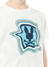 KIDS' KLAUS PIMA GRAPHIC TEE. Off-white classic fit pima jersey tee with a large, wavy, layered blue, dark blue, and tan Psycho Bunny skull graphic featuring scalloped edges on the chest. (3)