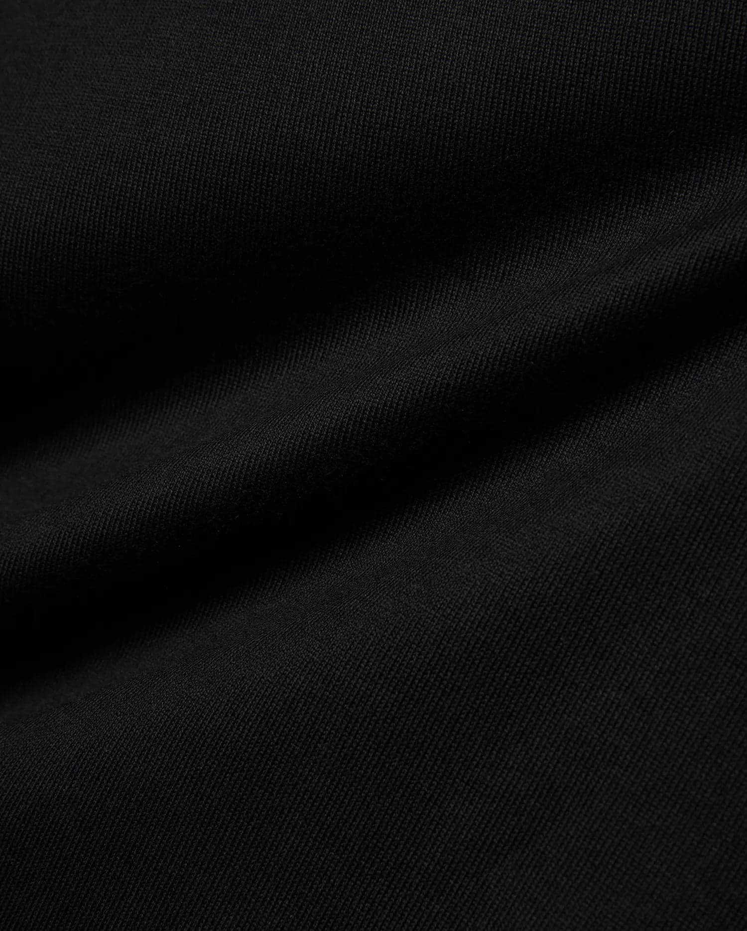 Kid's Norman Longsleeve Oversized Tee, a premium black jersey knit garment from Psycho Bunny, offering a soft texture and relaxed fit for ultimate comfort. (6)