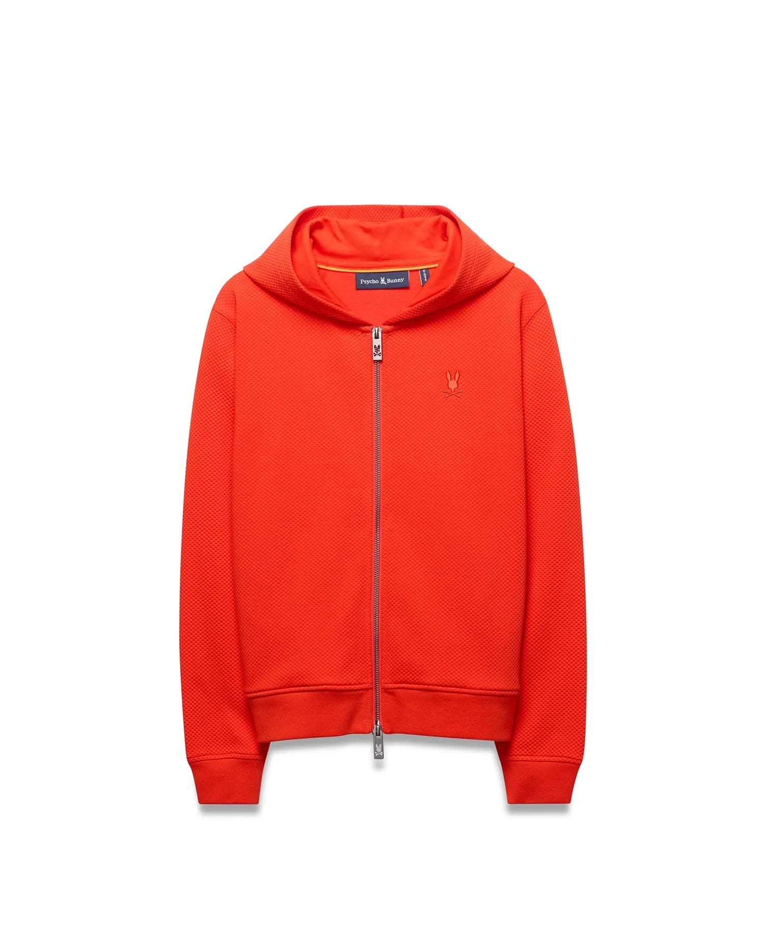 Kids Marc Textured Full Zip Hoodie in vibrant orange, featuring a textured knit fabric, full zip closure, hood, ribbed cuffs and hem, and a small embroidered Psycho Bunny skull logo on the left chest. (5)