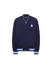 Kids Jaydon Track Jacket in navy blue, featuring a full zip, ribbed collar, and striped cuffs in white and light blue, with an embroidered Psycho Bunny skull logo on the left chest.