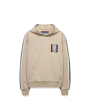Kids Ty French Terry Hoodie in beige, featuring navy and white sleeve stripes, a front kangaroo pocket, and a small embroidered Psycho Bunny skull logo patch on the left chest.