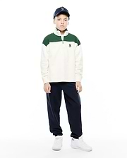 Kids Gabe French Terry 1/4 Zip, a relaxed fit cream pullover with green color-block shoulders, soft French terry fabric, a silver 1/4 zip, and a small embroidered Psycho Bunny skull logo on the left chest. (4)