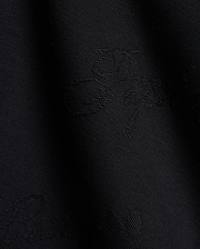 Premium black Kids Cedrick All Over Jacquard Crew featuring a refined, tonal all-over jacquard knit pattern of the iconic Psycho Bunny skull logo for subtle branding.
