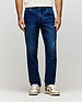 Mens Ace Knit Denim Pant in dark blue knit denim with subtle fading, a classic fit, and a small orange Psycho Bunny tag on the coin pocket.