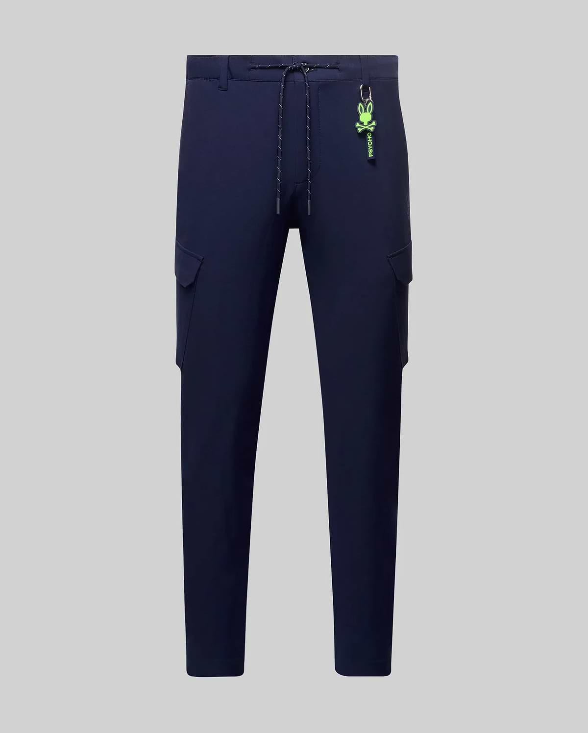 Mens Luka Cargo Pant in navy, featuring a relaxed fit, cargo pockets, drawstring waist, and a detachable neon green Psycho Bunny skull keychain. (6)