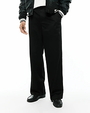 Mens Aidan Chino Pant, a sleek black premium menswear piece, featuring a relaxed, wide-leg fit and smooth, durable chino fabric, ideal for modern streetwear aesthetics. (3)