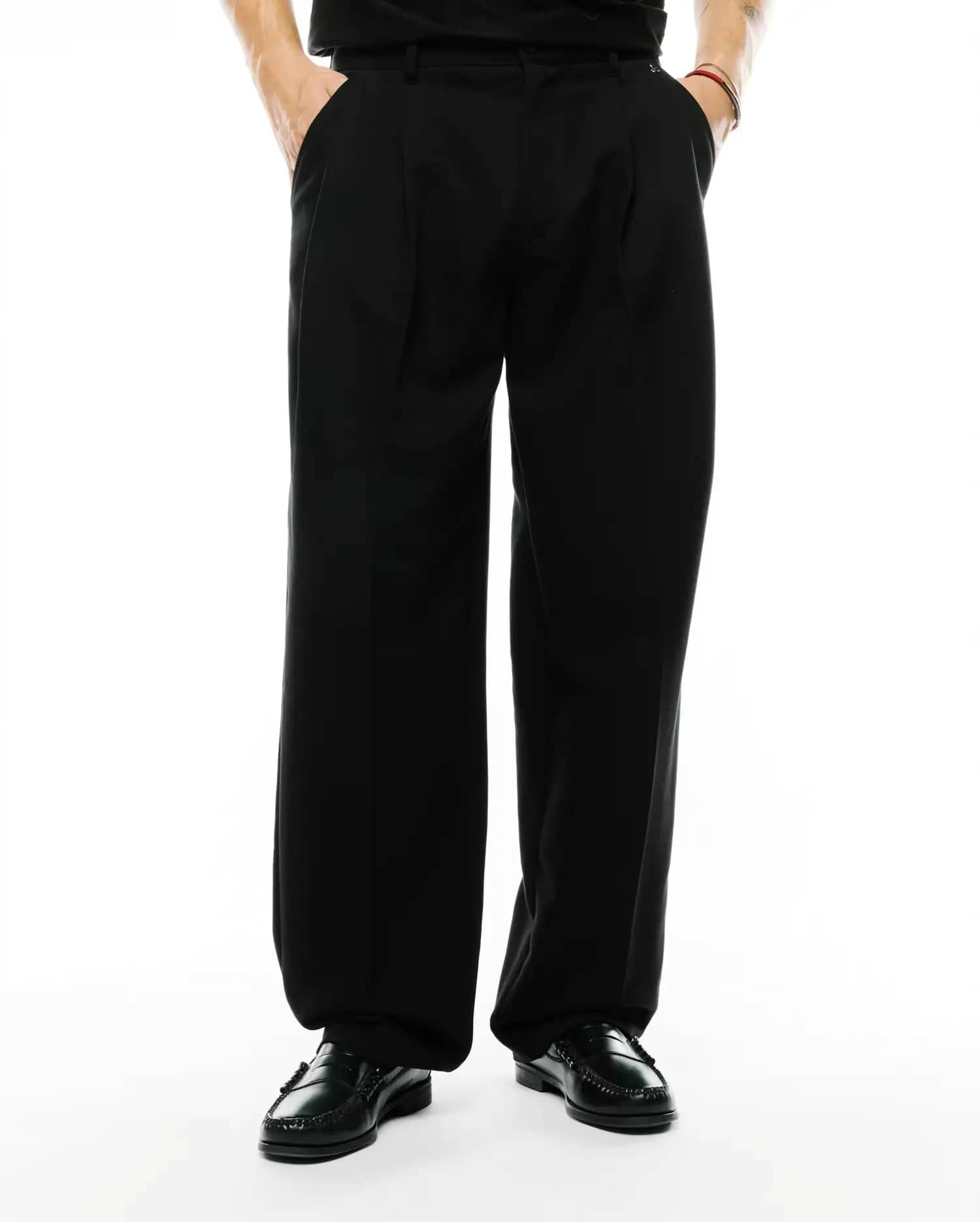 Men's Wayde Wide-Leg Pleated Pants in black, featuring a relaxed wide-leg fit, smooth fabric, and prominent front pleats for a refined streetwear look. (2)