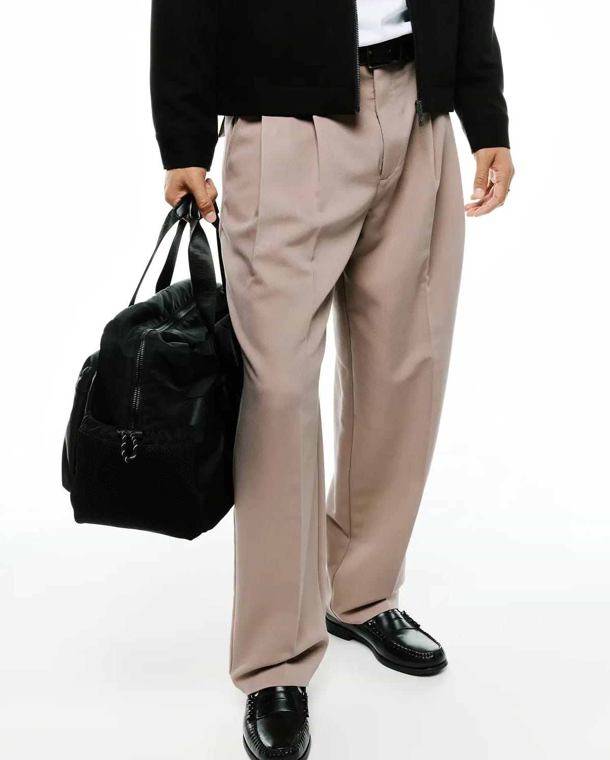 Men's Wayde Wide-Leg Pleated Pants in a smooth light beige fabric, featuring a relaxed wide-leg fit and prominent front pleats for a stylish streetwear look. (4)